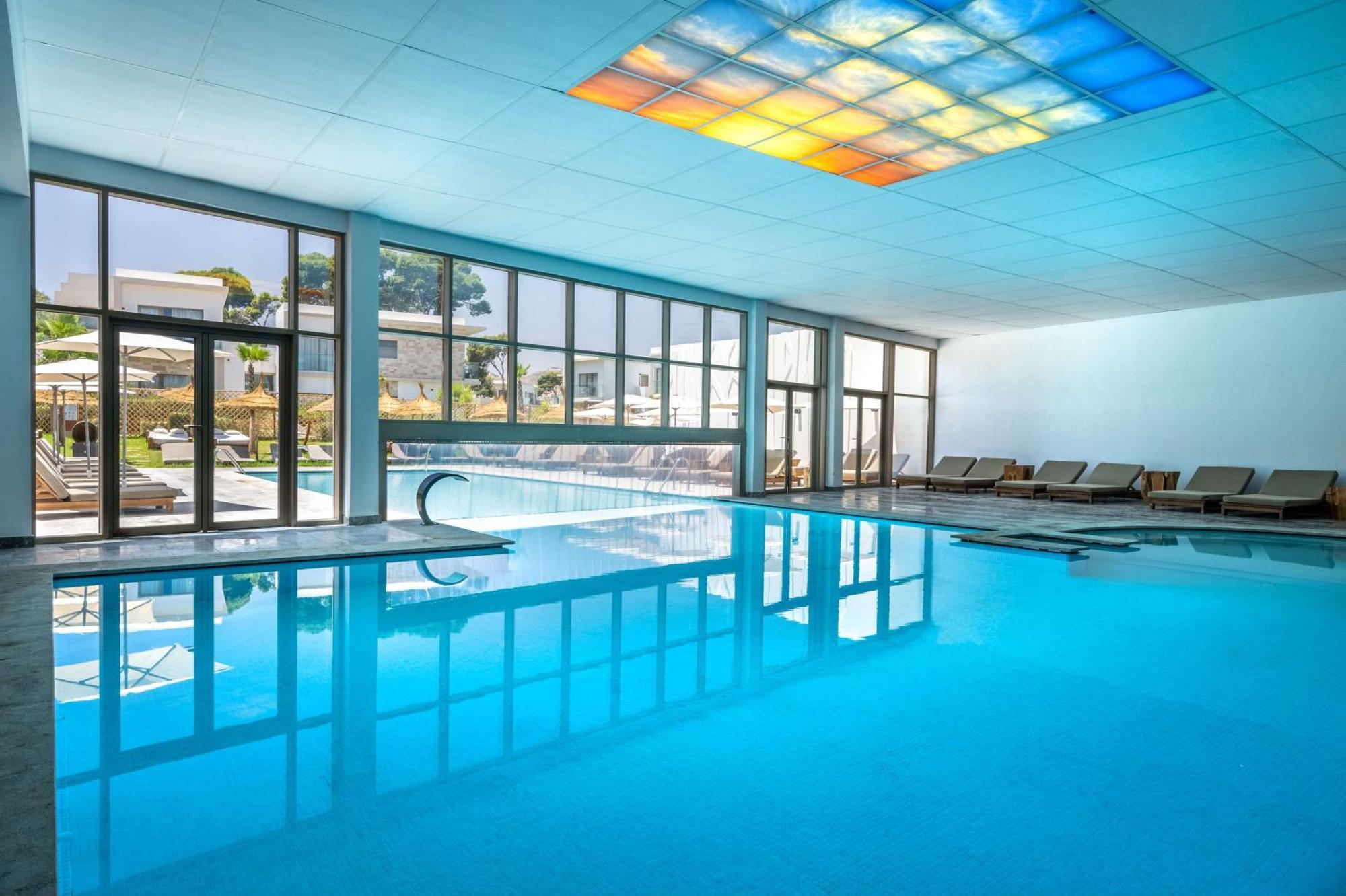 Radisson Blu Resort Al Hoceima Exterior photo The swimming pool at the hotel