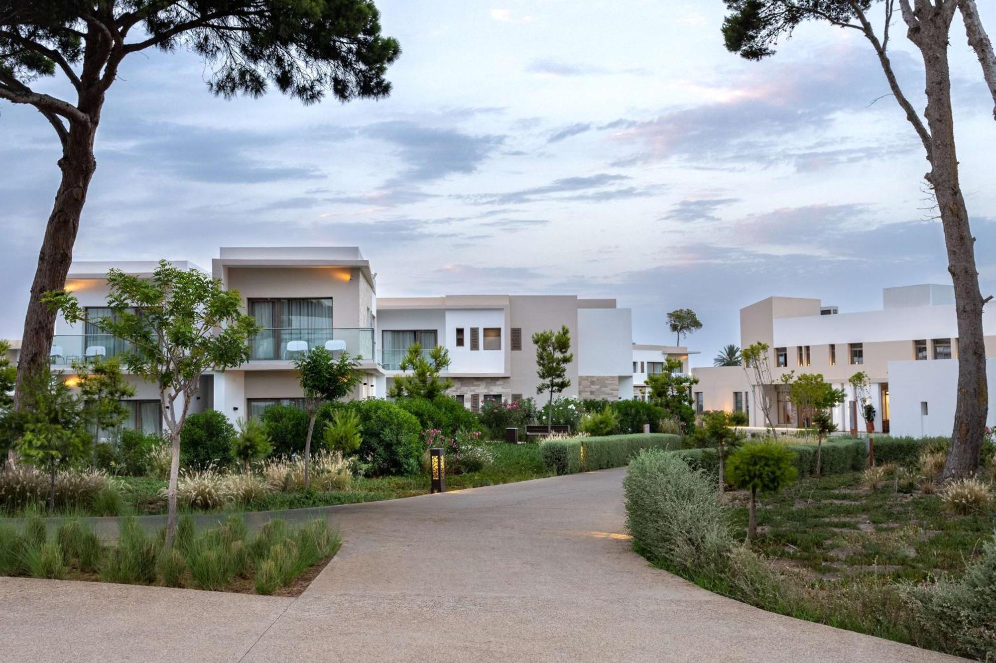 Radisson Blu Resort Al Hoceima Exterior photo The resort's villas